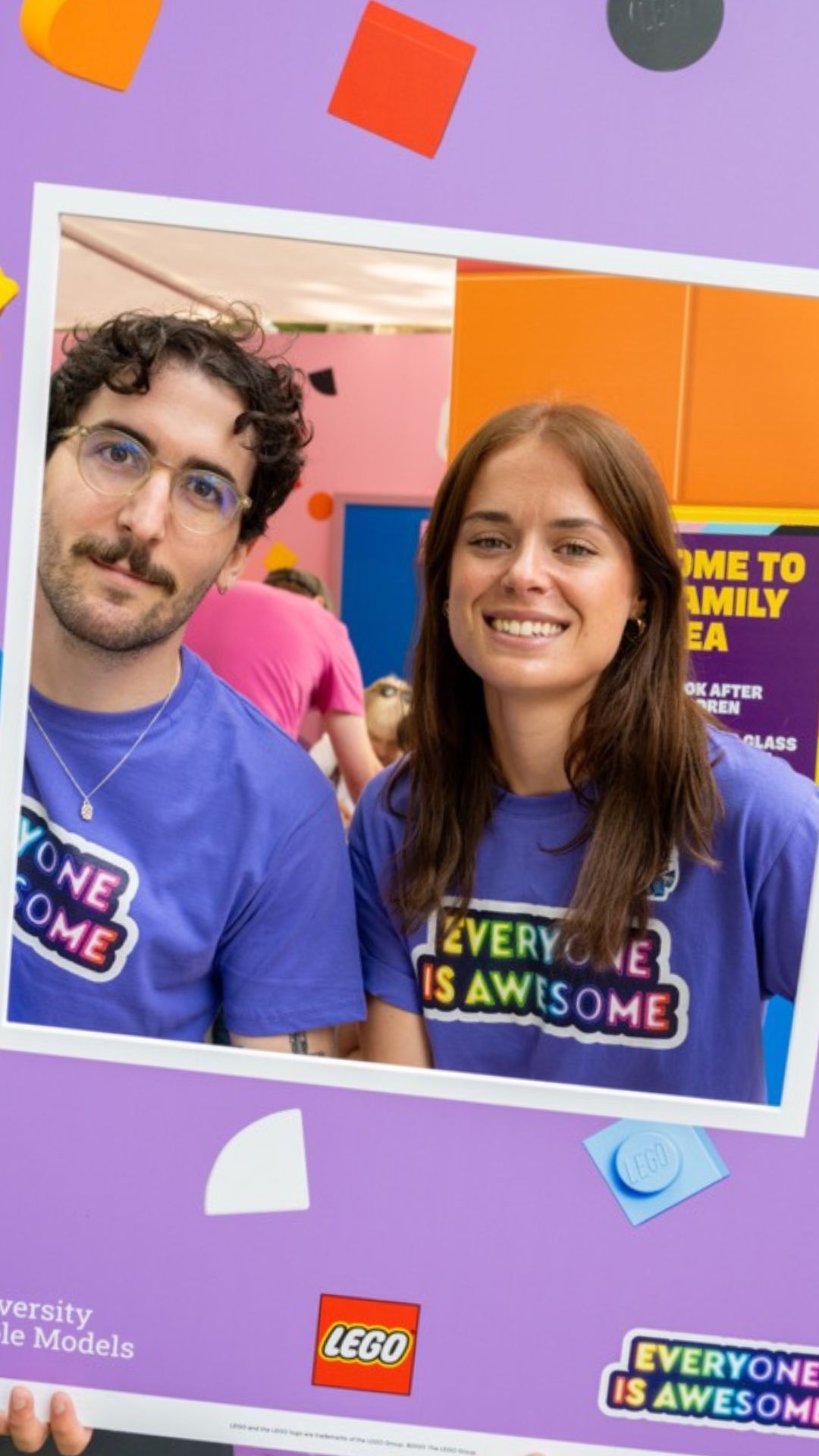 Two people at the PRIDE event posing for a photo